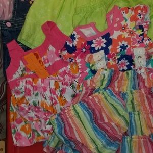 5 dresses and 5 diaper covers size 0-3 months